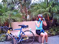 09.06 0005  Strong rider Andrea adjusts her Ray-Bans at Swamis Beach while listening to Sam tell some cycling whoppers!