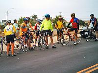 56bikepath01  Dan(floro green jersey) greets riders at MaGee Park before start. About 12 riders left Carlsbad at 8:30.
